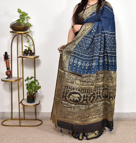 Blue Ajrakh dola silk saree with Nakshi Zari Pallu