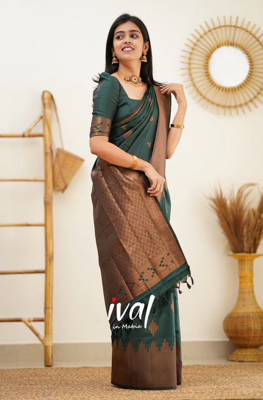 Dark Green Soft Silk Saree With Demure Blouse Piece