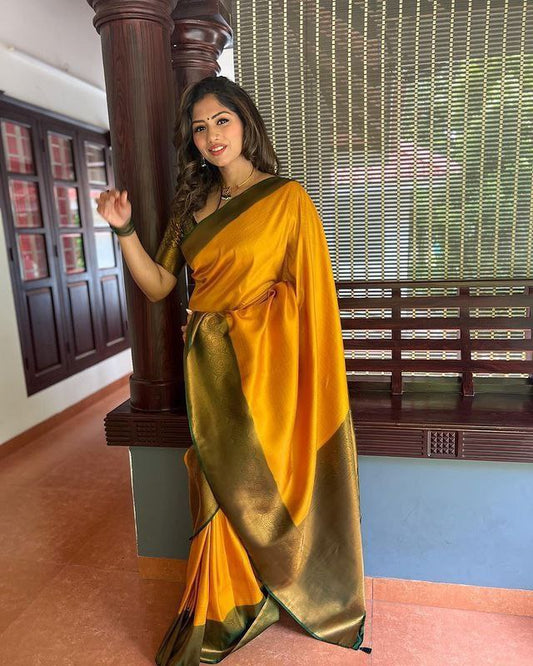 Yellow Soft Silk Saree With Demure Blouse Piece